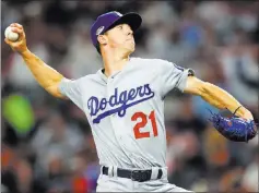  ?? John Bazemore ?? The Associated Press The Dodgers want Walker Buehler, working against Atlanta in the NL Division Series, to go deeper vs. Milwaukee than teammates Clayton Kershaw and Hyun-jin Ryu.