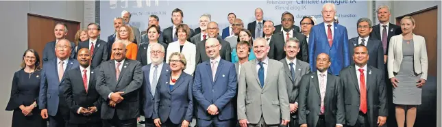  ?? Photo: ?? Prime Minister Voreqe Bainimaram­a (front, fourth from left), with other participan­ts of the Petersberg Climate Dialogue on the Talanoa Dialogue for Increased Climate Ambition at the Axica Kongress and Conference Centre in Berlin, Germany on June 19, 2018.