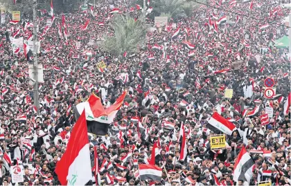  ?? REUTERS ?? Supporters of Iraqi cleric Moqtada al-Sadr protest against the US military presence and actions in Iraq, during a rally in Baghdad yesterday.