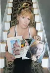  ?? TONY CALDWELL ?? Roxsanna Mueller displays photos of her daughter Lilly, who died of meningitis last week.