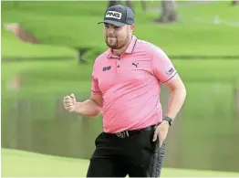  ?? GETTY IMAGES/LUKE WALKER Picture: ?? IN THE BAG: England’s Dan Bradbury celebrates winning the Joburg Open at the Houghton Golf Club.