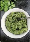  ??  ?? Basil pesto requires no cooking and comes together in minutes in a food processor or blender.