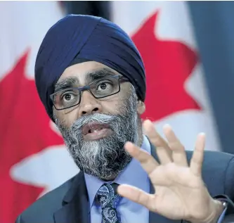  ?? SEAN KILPATRICK/THE CANADIAN PRESS ?? Defence Minister Harjit Sajjan takes part in a press conference at the National Press Theatre in Ottawa on Tuesday.