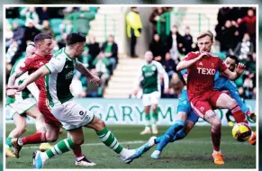  ?? ?? SORRY FAREWELL: Goodwin heads across the pitch to exit Easter Road following his sacking by chairman Cormack (inset below left) after the furious Aberdeen fans had made their feelings clear (inset left). But it was an enjoyable day for Campbell after scoring Hibs’ first goal (above) and then celebratin­g the second (below)