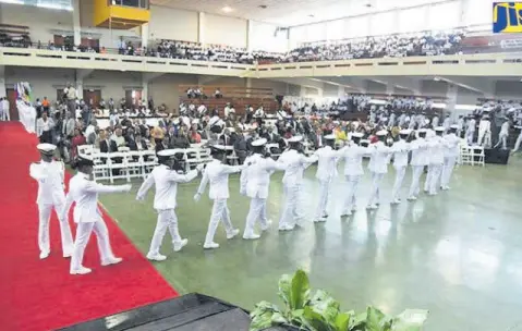  ?? CONTRIBUTE­D PHOTOS ?? Cadets of the Caribbean Maritime University perform a drill at the university’s Charter Day.