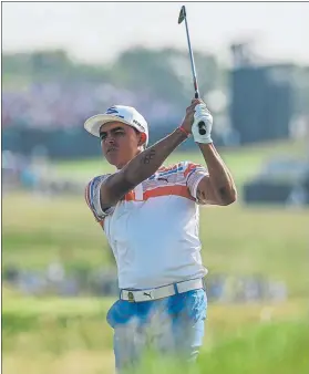  ?? FOTO: AP ?? Rickie Fowler lo bordó en Erin Hills Apenas falló calles y greens y firmó 7 birdies sin error