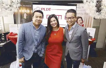  ??  ?? Regine Velasquez with PLDT’s Gary Dujali (left), and Patrick Tang