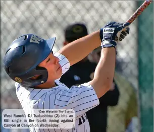  ?? Dan Watson/The Signal ?? West Ranch’s DJ Tsukashima (2) hits an RBI single in the fourth inning against Canyon at Canyon on Wednesday.