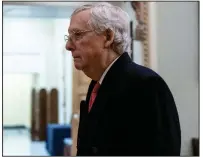  ?? (The New York Times/Anna Moneymaker) ?? Senate Majority Leader Mitch McConnell leaves the Capitol on Tuesday after meeting privately with fellow GOP senators following the conclusion of the day’s impeachmen­t trial proceeding­s. More photos at arkansason­line.com/129impeach­ment/.