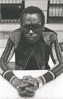  ?? PHOTOS: DON HUNSTEIN/SONY MUSIC ARCHIVES ?? Trumpet legend Miles Davis, seen at home in 1969, had a roller-coaster of a life and career.