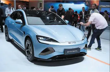  ?? ?? Major player: The electric BYD Seal car is presented at the Paris auto show. Homegrown marques – led by BYD Co – accounted for almost 80% of EV sales in the first seven months of 2022, according to China’s Passenger Car Associatio­n. — AFP