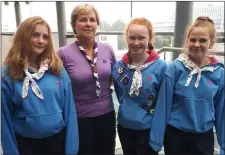  ??  ?? Ardilaun Guide members Niamh McFall, Aisling Burns and Mia Normoyle O’Sullivan with their leader, Deirdre Henley, who recently travelled to Copenhagen as part of the Irish contingent of Irish Girl Guides.