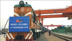  ?? GONG XIANMING / FOR CHINA DAILY ?? The China-Europe freight train, X8024, hisses out of the Yiwu West Station in East China’s Zhejiang province on its way to Madrid, Spain, on Saturday. The weekly train service is one of several routes connecting the eastern Chinese export hub with...