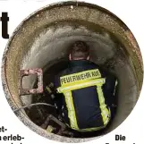  ?? ?? Die Feuerwehr rückte an, um die Mieze aus dem Gully zu retten.