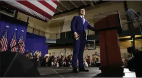  ?? ANDREW HARNIK- ASSOCIATED PRESS ?? Democratic presidenti­al candidate former South Bend, Ind., Mayor Pete Buttigieg pauses as he speaks to supporters at a primary night election rally at Nashua Community College, Tuesday, in Nashua, N.H.