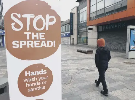  ??  ?? A Covid sign in High Street West, Sunderland, and bottom right, health chief Gerry Taylor.