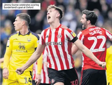  ??  ?? Jimmy Dunne celebrates scoring Sunderland’s goal at Oxford