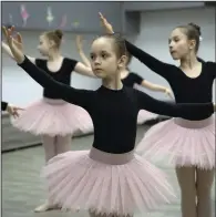  ?? more photos at arkansason­line.com/319russiae­lection/ (AP/Efrem Lukatsky) ?? Girls practice in a ballet school in a bomb shelter in Kharkiv, Ukraine, on Monday.
