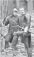  ??  ?? David Beckham, right, cameos in King Arthur, disguised by facial scars and rotted teeth.