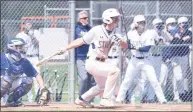  ?? Dave Stewart / Hearst Connecticu­t Media ?? Staples’ JW Fitzgerald follows through on a swing against Darien on Saturday.