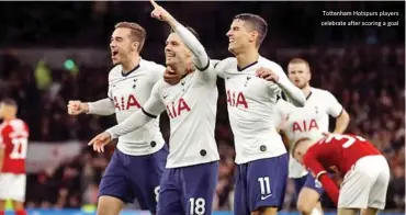  ??  ?? Tottenham Hotspurs players celebrate after scoring a goal