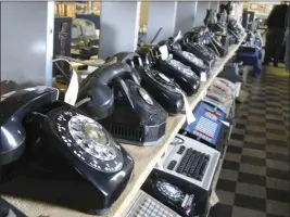  ?? ]JEFFERY SAULTON — NEWS AND SENTINEL ?? On Nov. 12, 2011, rows of old and newer telephones along with office switchboar­ds are seen in the museum operated by members of the Parkersbur­g Council of the Telecomm Pioneers in Parkersbur­g, W.Va.