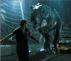  ??  ?? Ian Malcolm (played by the ever entertaini­ng Jeff Goldblum) chases from a T-Rex in Jurassic Park (Sunday, ITV, 5.45p.m.) still packing a punch after 27 years,