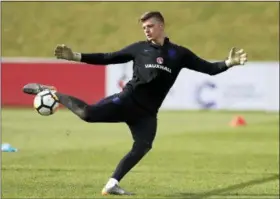  ?? THE ASSOCIATED PRESS ?? England goalkeeper Nick Pope attends a training session at St George’s Park, Burton, England, Tuesday.