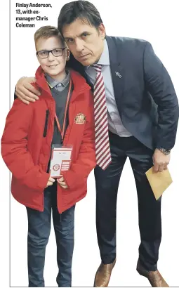  ??  ?? Finlay Anderson, 13, with exmanager Chris Coleman