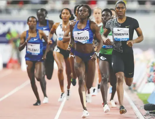  ?? PHOTOS: KaMRaN JEBREILI/THE ASSOCIATED PRESS ?? Caster Semenya, right, races to a gold medal in the women’s 800-metre final during the Diamond League in Doha, Qatar, on Friday.