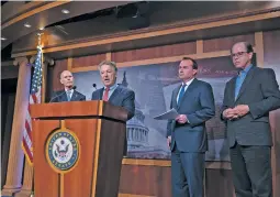  ?? J. SCOTT APPLEWHITE/ASSOCIATED PRESS ?? A group of Republican senators, from left, Sen. Rick Scott, R-Fla.; Sen. Rand Paul, R-Ky.; Sen. Mike Lee, R-Utah; and Sen. Mike Braun, R-Ind., tell reporters the COVID-19 vaccine mandate for members of the U.S. military should be rescinded under the annual defense bill at the Capitol in Washington on Wednesday. The House passed a bill scrapping the mandate Thursday.
