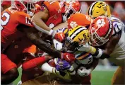  ?? ASSOCIATED PRESS ?? In this Jan. 13, 2020, file photo, LSU wide receiver Justin Jefferson (2) is tackled by Clemson during the first half of the national championsh­ip.