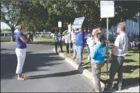  ??  ?? CSEA negotiatio­n chair Desiree Wise, left, talks with fellow protesters during Tuesday’s protest.