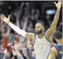  ?? Tony Dejak ?? The Associated Press Cleveland superstar Lebron James, after his team’s front office sent six teammates away in trades: “It’s time to go to work.”