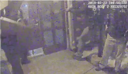  ?? CHICAGO POLICE DEPARTMENT VIDEO ?? Police used a battering ram to break into the front door of Anjanette Young’s home.