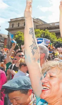  ??  ?? Marriage equality supporters celebrate as the result of the same-sex marriage survey