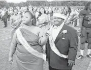  ?? Stephen M. Dowell / Orlando Sentinel ?? Bubba Hunter and Semone Adkins were crowned homecoming king and queen at West Orange High School in October 2013 in Winter Garden, Fla.