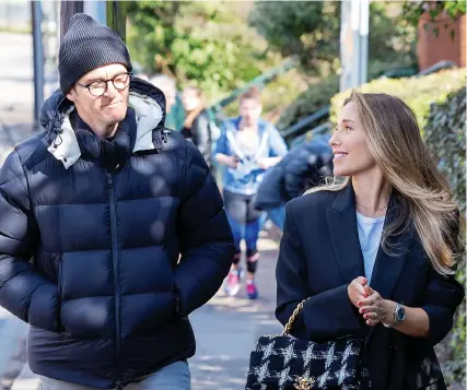  ?? Photograph: Yui Mok/PA ?? Bristol Rovers manager Joey Barton and wife Georgia Barton leave Wimbledon Magistrate­s’ Court on Friday