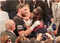  ?? AP ?? Tyson Fury (left) and WBC heavyweigh­t champion Deontay Wilder face each other on Saturday, after Tyson narrowly beat Francesco Pianeta on points. —