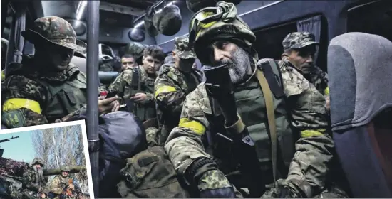  ??  ?? Proud to fight for Ukraine: Cherkassky with members of his Dnepro Battalion ( above, left and bottom)