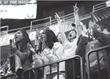  ?? STAFF FILE PHOTO BY ERIN O. SMITH ?? UTC fans celebrate during a men’s basketball game this past January at McKenzie Arena. UTC athletic director Mark Wharton has invited the program’s supporters to offer feedback by joining a new council.