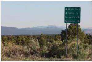  ?? (AP/Morgan Lee) ?? A haze of wildfire smoke hangs over the Upper Rio Grande valley and the mesa-top city of Los Alamos, N.M., on Thursday.