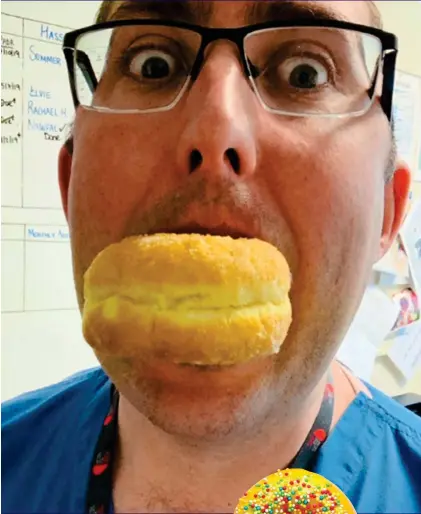  ??  ?? HEART OF THE MATTER: Cardiology registrar Jason O’Neill takes a bite out of his doughnut