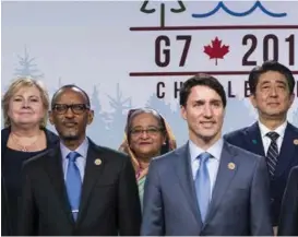  ?? FOTO: NTB SCANPIX ?? I FØRERSETET: Statsminis­ter Erna Solberg (H) snakket varmt om havsatsing­en på G7-toppmøtet i Canada i juni. Her med (fra v.) president i Rwanda Paul Kagame, president på Marshalløy­ene Hilda Heine, statsminis­ter i Canada Justin Trudeau og Japans statsminis­ter Shinzo Abe.