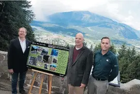  ?? AARON ORLANDO/REVELSTOKE MOUNTAINEE­R FILES ?? MP David Wilks, centre, joined Oshawa MP Colin Carrie, left, and Glacier National Parks’ Nicholas Irving for a July 16 funding announceme­nt that has since come under scrutiny.
