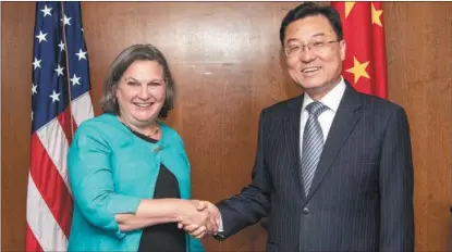  ?? PROVIDED TO CHINA DAILY ?? Chinese Ambassador to the US Xie Feng (right) meets with US Under Secretary of State Victoria Nuland on May 25 in Washington DC.