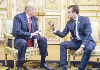  ?? AP ?? US President Donald Trump and French President Emmanuel Macron meet at the Elysee Palace in Paris yesterday. Trump is joining other world leaders at centennial commemorat­ions in Paris this weekend to mark the end of World War I.