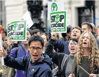  ?? PETER NICHOLLS REUTERS ?? Extinction Rebellion protesters demonstrat­e at Trafalgar Square in London, Britain, Oct 7.