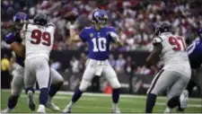  ?? ERIC CHRISTIAN SMITH — THE ASSOCIATED PRESS ?? Giants quarterbac­k Eli Manning will need to be kept upright by the rebuilt offensive line on Sunday against the Saints.