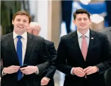  ?? EFE ?? El presidente de la Cámara de Representa­ntes Paul Ryan (derecha) sale satisfecho luego de aprobar el primer paso para derogar el Obamacare.